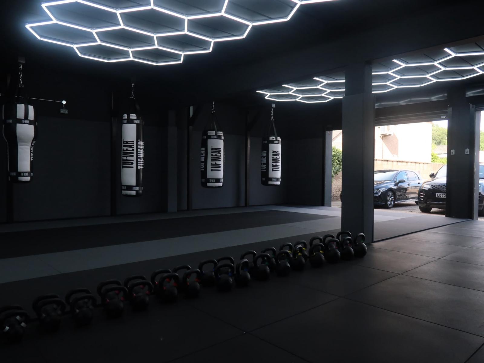 Kettlebells lined up in the strength and conditioning area